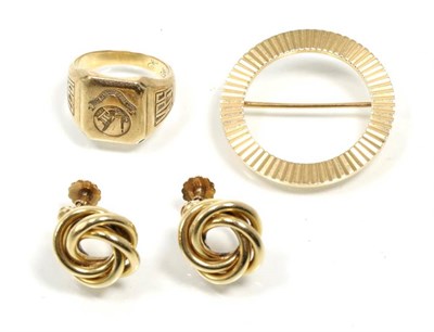 Lot 320 - A pair of knot pattern earrings, with screw back fittings, stamped '14K', a disk brooch,...