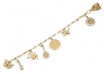 Lot 321 - A long and short link charm bracelet, suspending various charms, including a model of the...