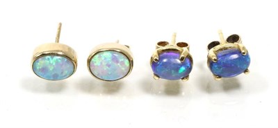 Lot 328 - A pair of black opal stud earrings, oval cabochon black opal in claw settings, with post...