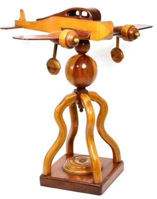 Lot 369 - A treen model of an aeroplane on stand