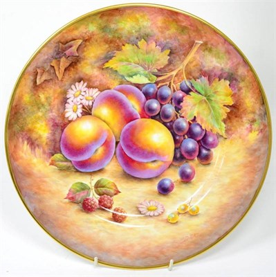 Lot 373 - A Royal Worcester fruit plate, signed D Fuller, black printed mark