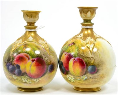 Lot 382 - A matched pair of Worcester fruit study vases, signed Ricketts