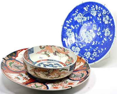 Lot 392 - A large Japanese Imari charger; together with an Imari bowl; and a Chinese blue and white...