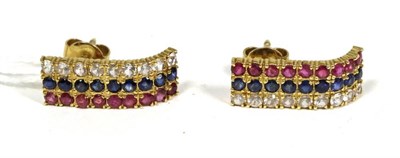 Lot 412 - A pair of Asian ruby, sapphire and white paste earrings, as rows of round cut stones to a...