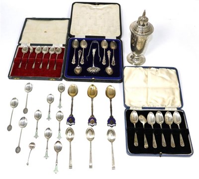 Lot 420 - A silver sugar caster Birmingham, 1936; with a cased set of six silver spoons with tongs and...