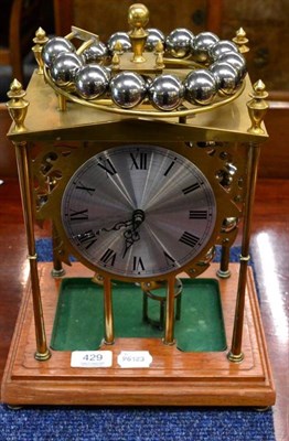 Lot 429 - A novelty ball clock complete with twenty four steel balls