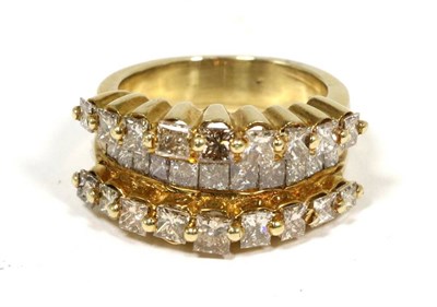 Lot 437 - A diamond half hoop ring, as three bands of graduated princess cut champagne-coloured diamonds,...