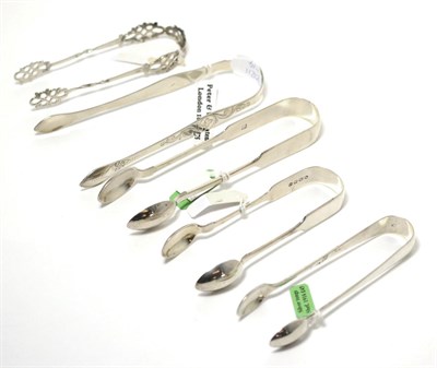 Lot 20 - Five pairs of silver tongs including two Exeter examples and an example by Peter and William...