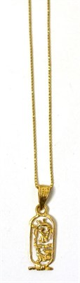 Lot 22 - A yellow metal pendant and chain, chain clasp stamped '750'