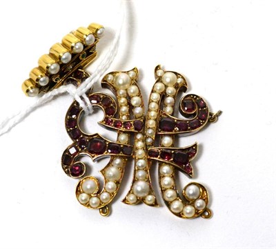 Lot 31 - A gem set monogram pendant, an interlocked 'MR' monogram set with calibré cut garnets and...