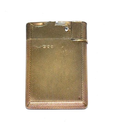 Lot 55 - An Asprey silver gilt lighter, with engine turned engraving