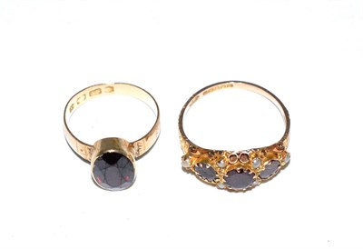 Lot 56 - A Victorian garnet and seed pearl ring and a garnet ring (2)