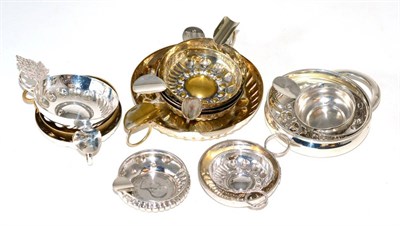 Lot 60 - A group of six continental and American silver wine tasters and a collection of eight silver plated