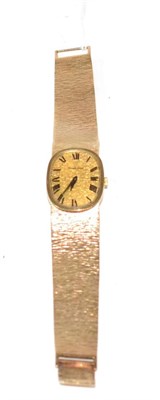 Lot 73 - A Bueche-Girod 9 carat wristwatch, Roman dial, textured stamp