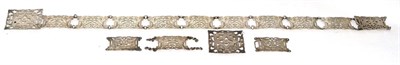 Lot 75 - A silver belt (fourteen links and two parts)