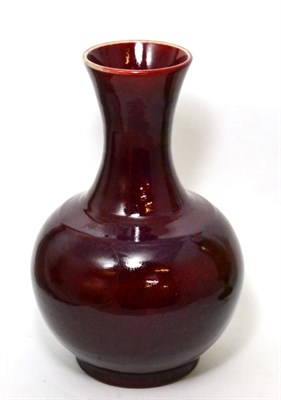 Lot 112 - A Chinese sang de boeuf bottle vase, 33cm in height