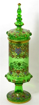Lot 113 - A Victorian enamelled and gilt green glass sweet meat jar and cover