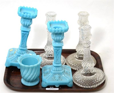 Lot 131 - A set of three Baccarat glass candlesticks, a pair of Victorian examples, etc