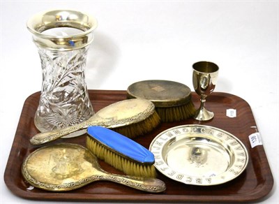 Lot 138 - A silver alphabet christening dish, silver and enamel dressing table items, a silver rimmed cut...