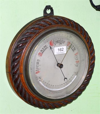 Lot 162 - An oak aneroid barometer