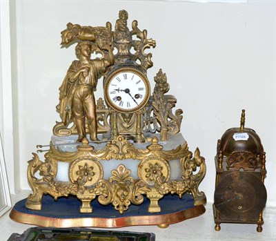 Lot 169 - A 19th century gilt metal and alabaster figural mantel clock and a lantern style timepiece