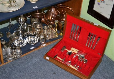 Lot 180 - A quantity of silver plated items, a canteen of cutlery and copper kettles etc (two shelves)