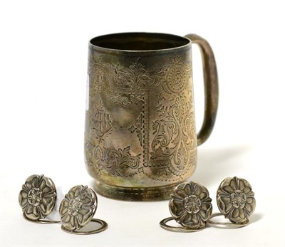Lot 217 - A Victorian silver christening mug together with a set of four menu holders in the form of a...