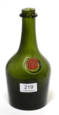 Lot 219 - An 18th/19th century green glass bottle with wax seal