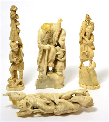 Lot 225 - Two Japanese Meiji period carved ivory okimono; together with another broken larger example