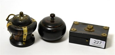 Lot 227 - A 19th century ivory mounted ebony inkwell with hinged cover, a later turned ebony trinket box...