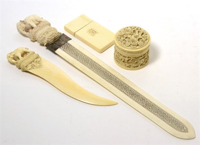 Lot 228 - An Indian white metal mounted carved ivory paper knife, circa 1900; together with a Chinese...