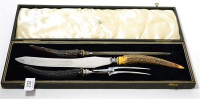 Lot 232 - An Asprey three piece carving set (cased)