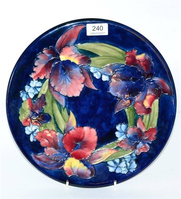 Lot 240 - A Walter Moorcroft Orchid and Spring Flowers charger