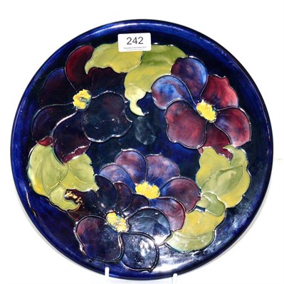 Lot 242 - A Walter Moorcroft Clematis charger