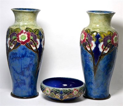 Lot 248 - A pair of Royal Doulton Lambeth stoneware vases and a matching bowl (3)