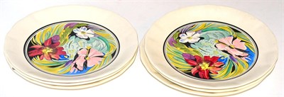 Lot 274 - A set of six Clarice Cliff Bizarre plates, designed by M.J.Riach, each decorated with flowers...