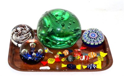 Lot 276 - An oversized Victorian dump paperweight, three other paperweights and a small group of glass sweets