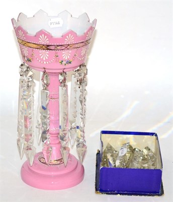 Lot 290 - A pink glass Victorian lustre with a box of extra glass lustres