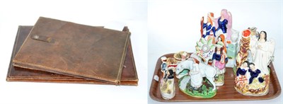 Lot 291 - A quantity of Staffordshire figures and two leather photograph folders