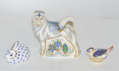 Lot 299 - Three Royal Crown Derby animal paperweights ";Husky";, platinum edition rabbit and a bird, with one