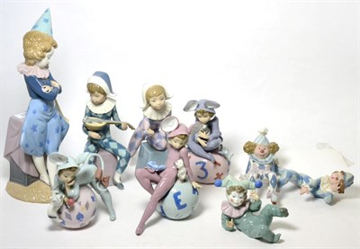 Lot 310 - Eight Lladro clown figures and one Nao