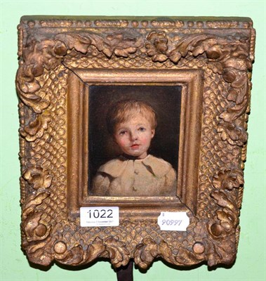 Lot 1022 - An Edwardian portrait of a young boy, oil on panel, in an elaborate gilt frame