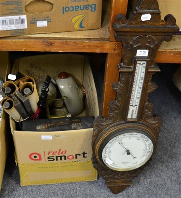 Lot 1103 - An oak barometer, three walking sticks, a bed pan, a fender, a mirror, a standard lamp, a table...