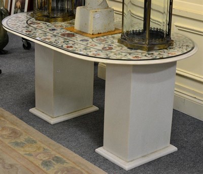 Lot 1150 - A white marble and Pietra Dura dining table, of recent date, inlaid with various marble samples...