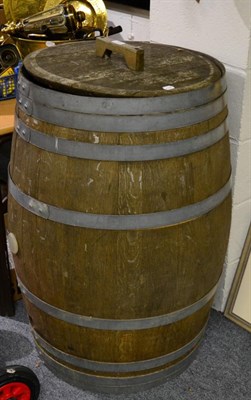 Lot 1160 - A coopered oak barrel with lid