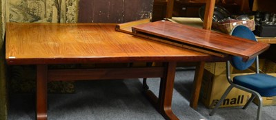 Lot 1162 - A 1970's Danish Skovby rosewood extending dining table, with two leaves, on shaped supports...