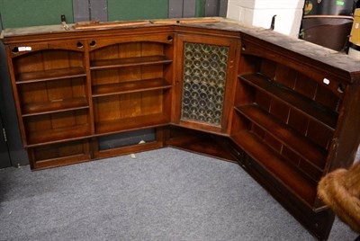 Lot 1169 - ^ An early 20th century oak hanging corner shelf