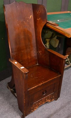 Lot 1171 - ^ A George III mahogany commode chair