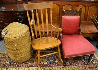 Lot 1177 - A wicker lidded basket with iron strap hinges together with a Windsor style rocking chair and a...