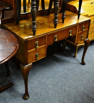 Lot 1183 - Wearing & Gillows dressing table with mirror back